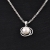 Medalion de argint cu perlă pentru damă "Cercurile vieții"
